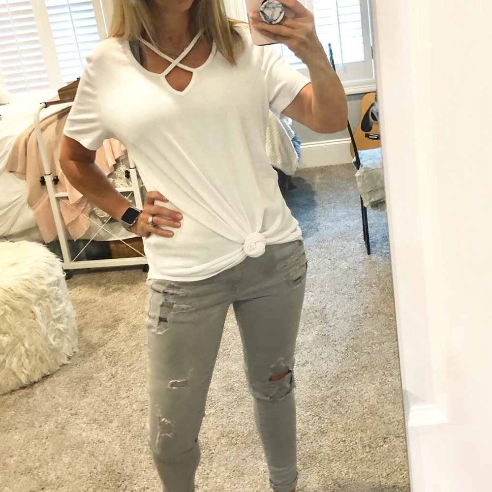 White top with criss cross neck